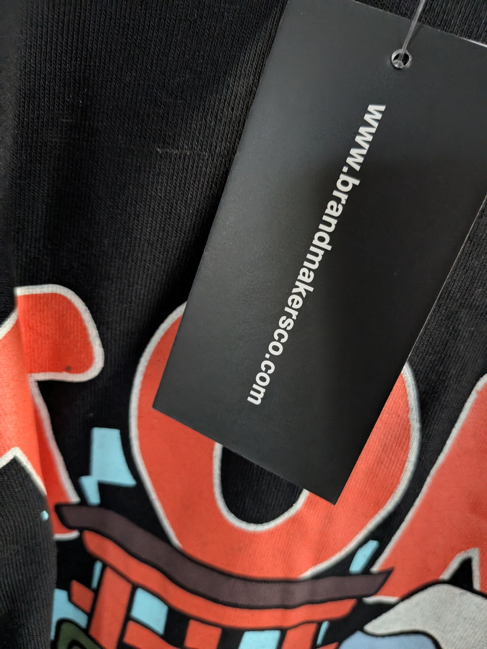 Black Graphic  T-shirt with Red Accents